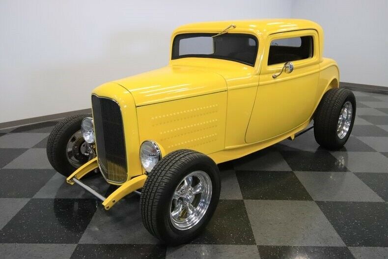 shiny 1932 Ford Coupe hot rod